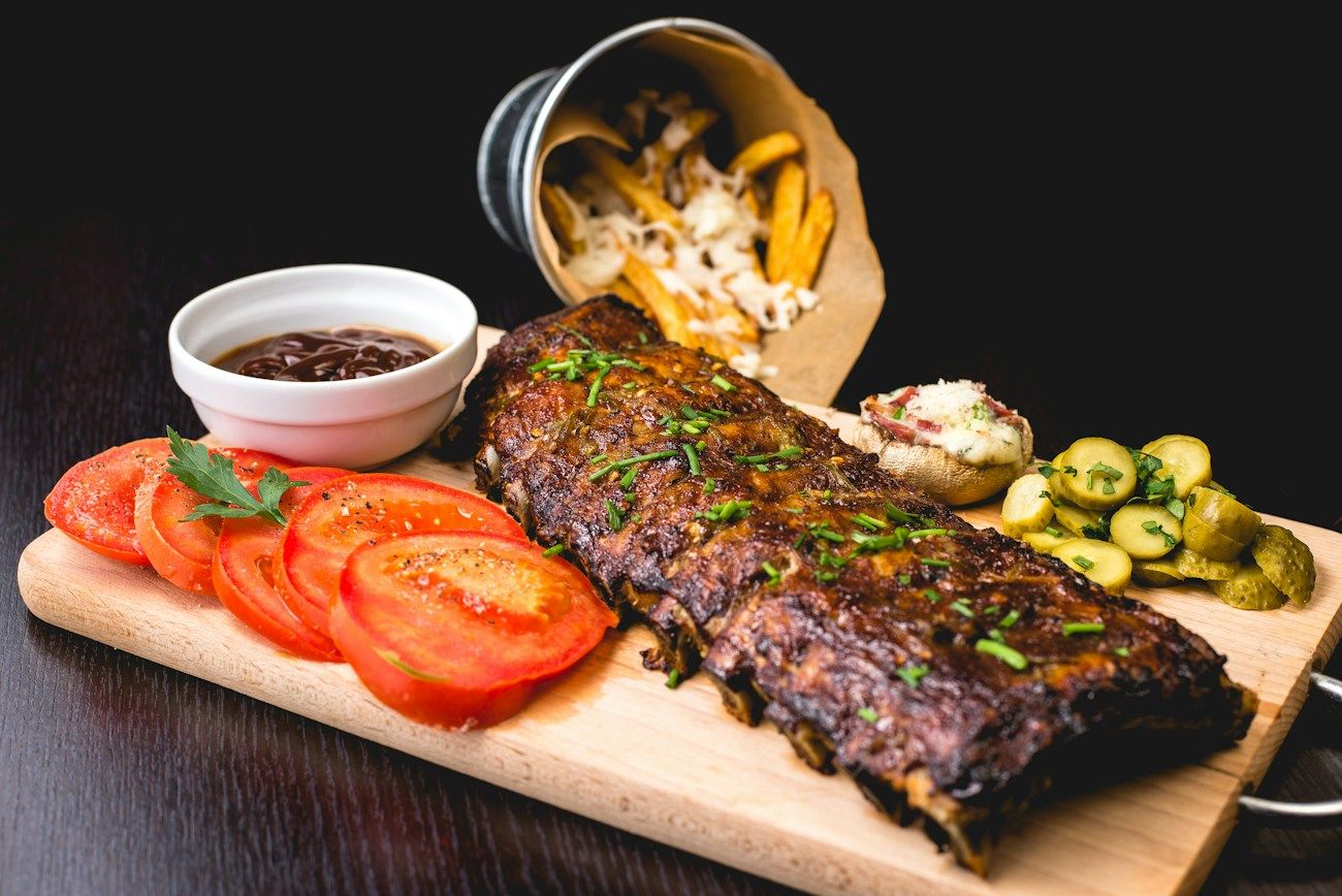 Richly seasoned grilled meat, a sample image for Lomo al Fuego